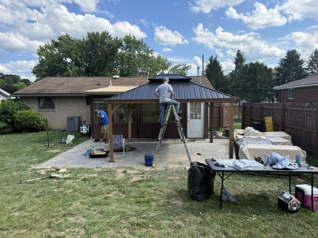 Hardtop gazebo / pergola kit roof frame going up in Moon Township